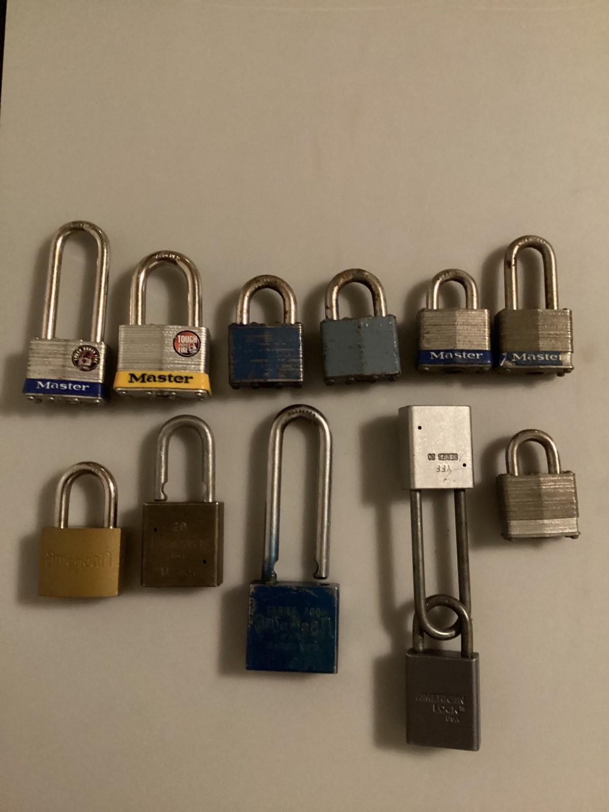 12 TWELVE PADLOCKS SEVEN MASTERLOCKS, SIX AMERICAN LOCKS, NO KEYS
