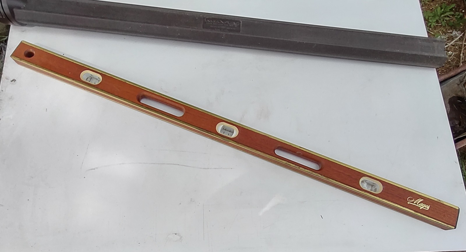 Vintage Mayes 48 inch wooden level with brass accents