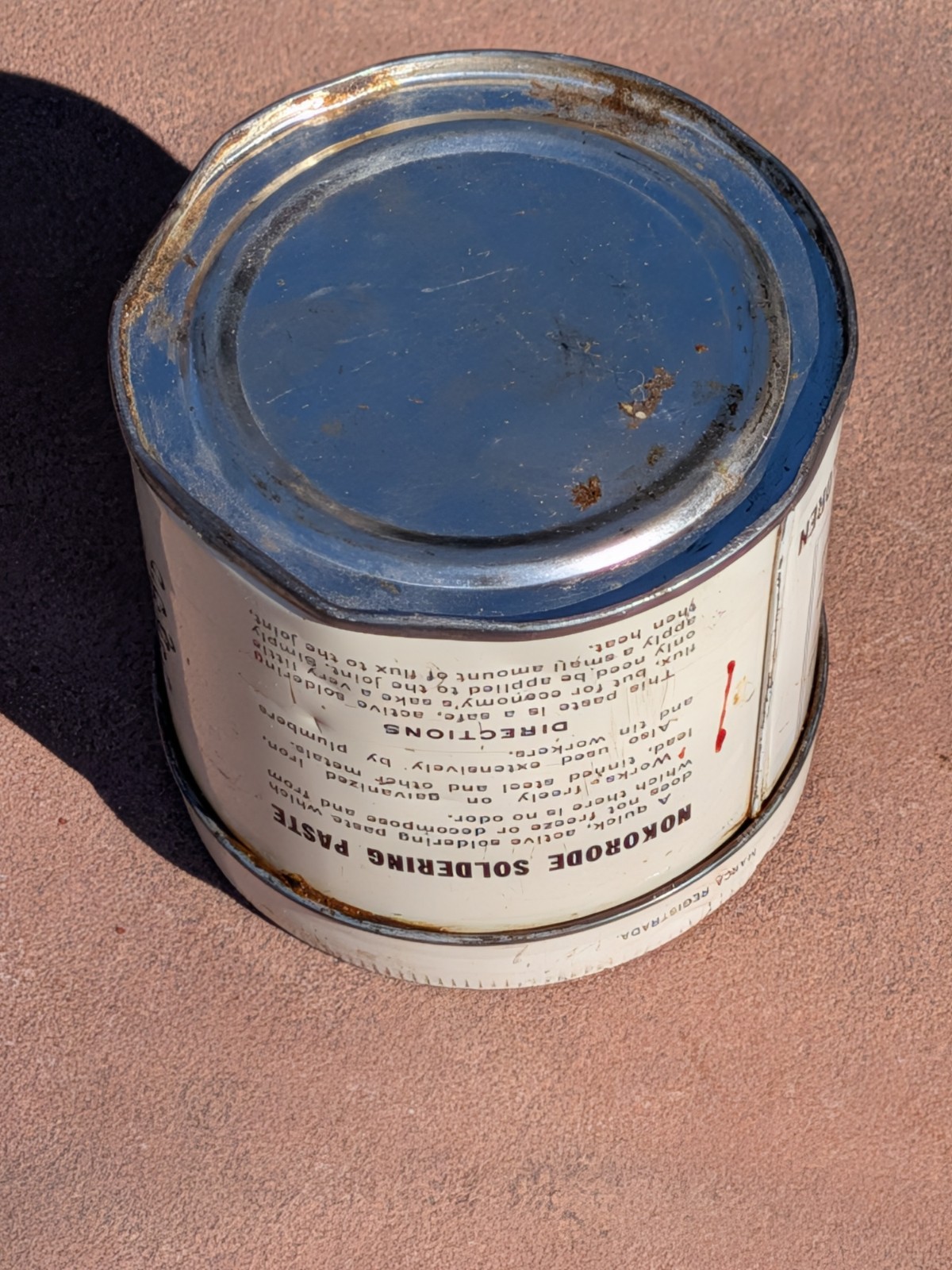 Nokorode Soldering Paste Tin 3” wide x 3 1/2″” tall 1926 Patent $8.50