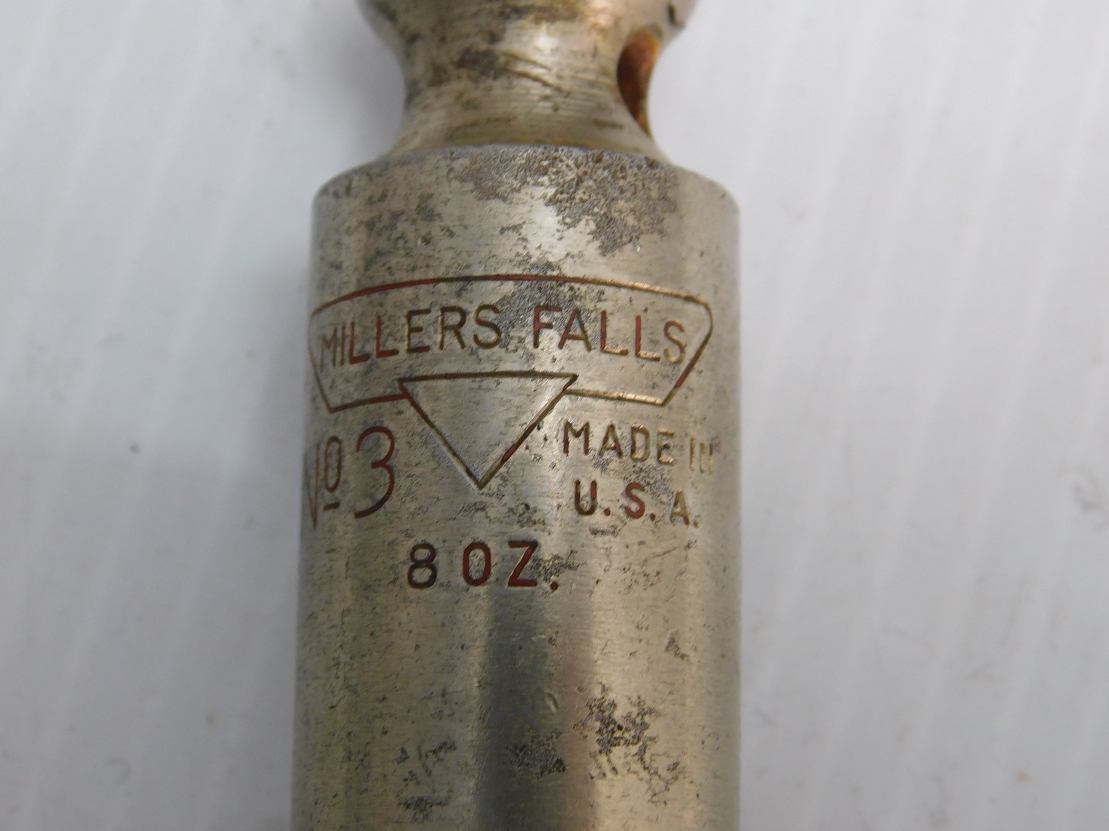 2 plumb Bobs , Miller Falls #3, 8 oz. 4″, plus an unmarked one