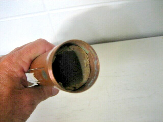 USALITE copper flashlight 14 1/4″ with belt clip and bulb, vintage