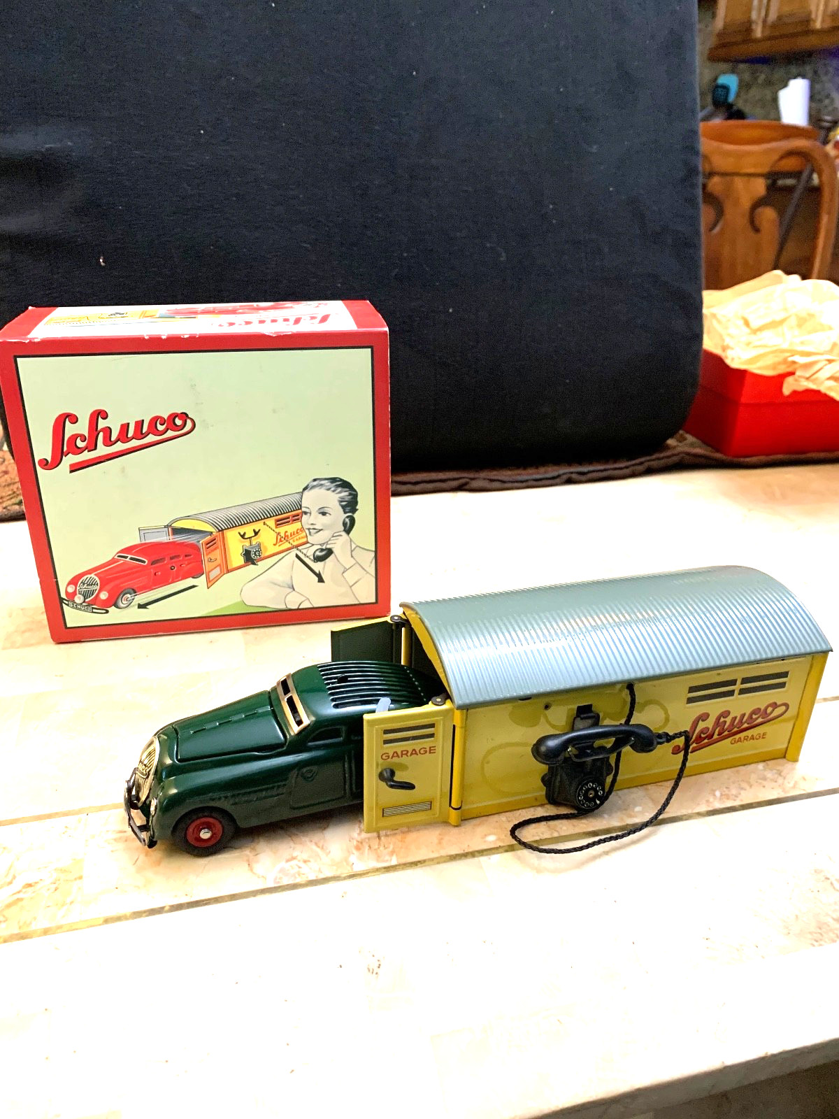 SCHUCO ,CAR ,GARAGE Steel NEVER PLAYED WITH,IN THE BOX.WORKS NEVER USED…