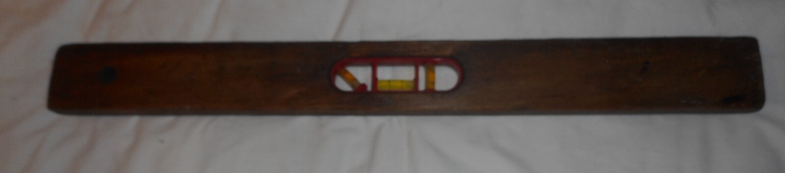 vintage wooden level 24″ long x 2 1/2″ x 1″ red plastic insert 90° & 45° angles