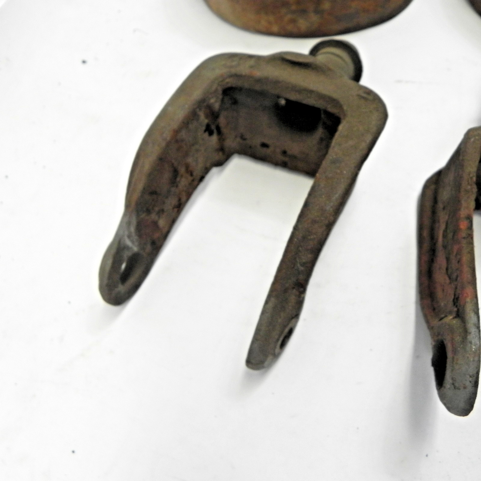 ANTIQUE IRON CASTER AND BEARING LOT WITH SOME PULLEYS ALL USED UNBRANDED