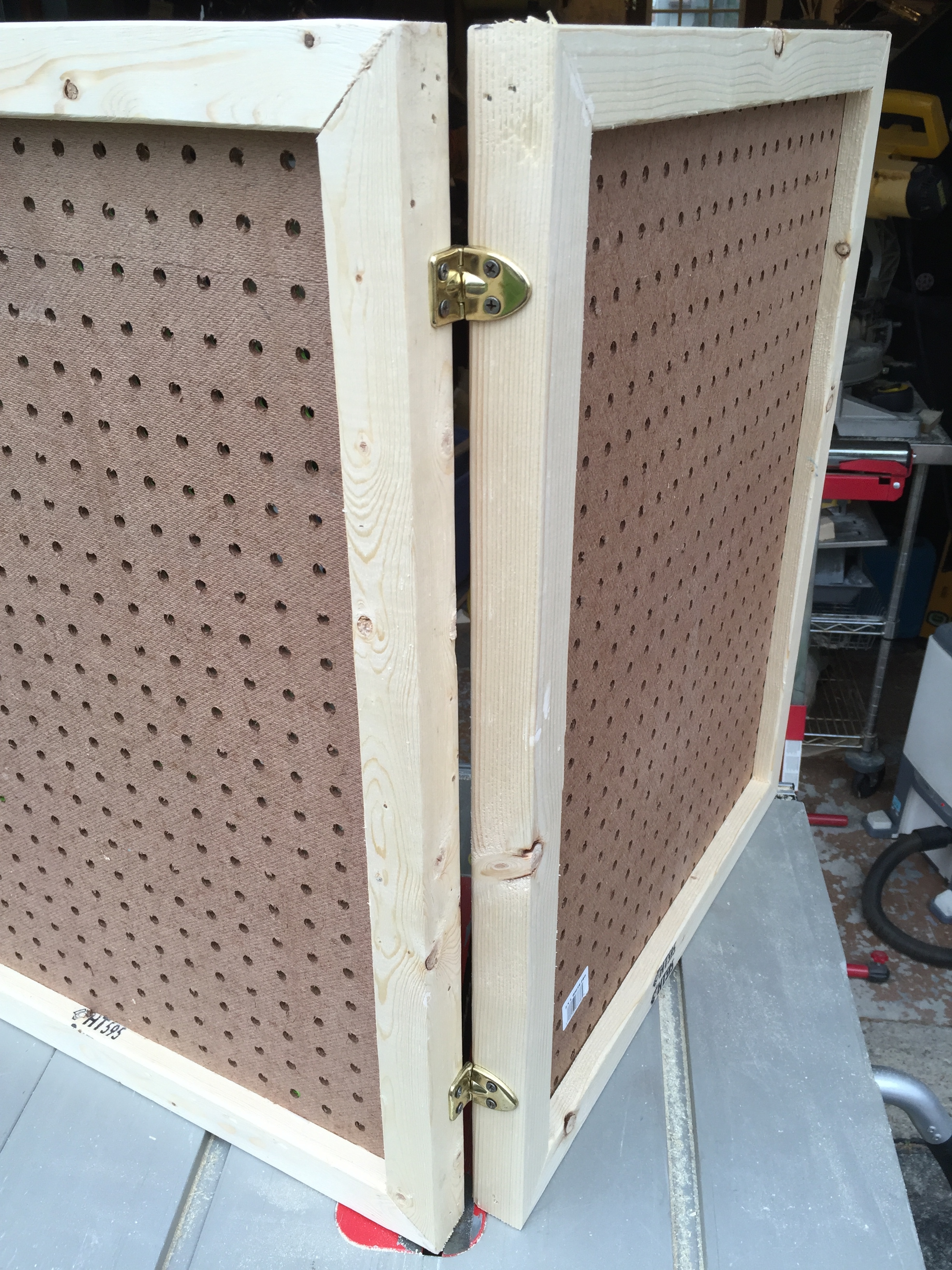 Make a folding pegboard display